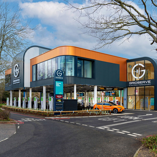 a photo of the exterior building of GRIDSERVE, an electric charging forecourt at London Gatwick