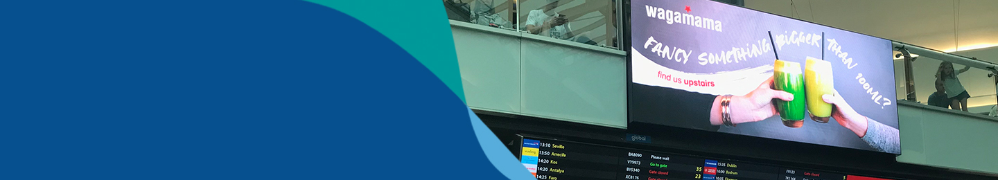 Banner image showing advertising site at London Gatwick with brand flow line element over image